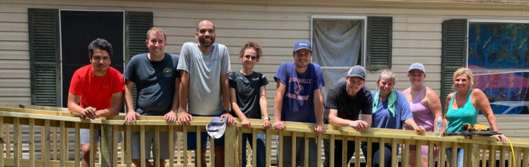 Vested Metals Volunteers with SJHP to Build Wheelchair Ramp